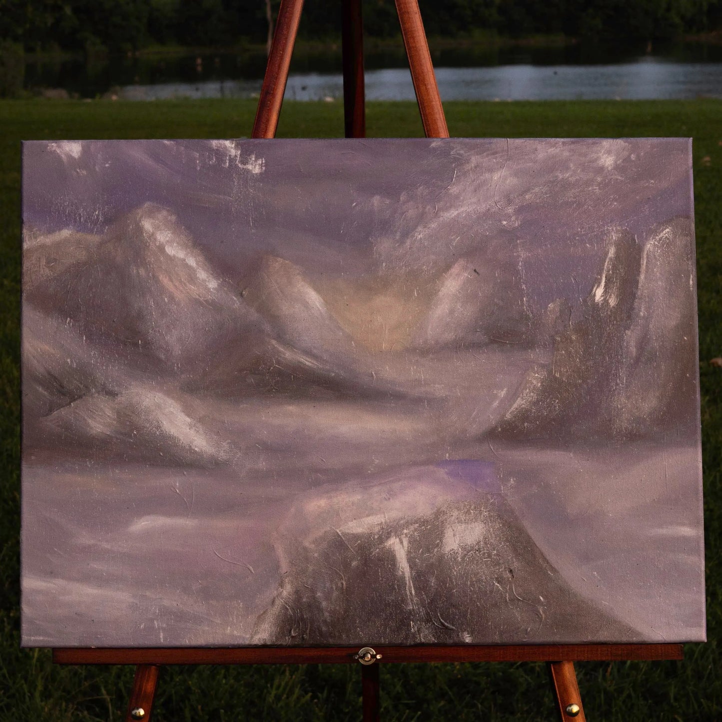 Mountains rise and fade into soft fog, their shapes barely visible through a haze of gray and lavender light. Veil of Mist is about in-between moments, quietness just before the sun breaks through, the stillness where the world holds its breath.
This palette is muted and calming, a wash of grays, purples, and cream that creates a sense of peace in any space. Gentle textures catch the light in subtle ways, giving the piece depth and movement without disturbing its tranquility.